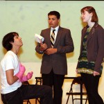 From left, freshman Troy Bond, as Jamison, freshman Preston Bogan, playing Dr. Wells, and Sophomore Chelsea Newman, playing Lady Ann, rehearse a scene for the high school production of “Ladies Sigh no More.”