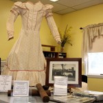 Historic artifacts, including a dress worn at the dedication of the Depot Street Bridge in 1935 and a photograph of the old wooden bridge were on display at the Beacon Falls Senior Center following the dedication of the newly repaired Depot Street Bridge April 8.