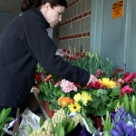 Lauren Greatorex of Woodbury shops for flowers at the Naugatuck Fire Department's flower sale April 21. The Fire Department raises funds for local charities.