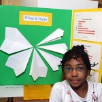 Helen Meade, 8, made paper airplanes with varying wingspans to see which would fly the furthest. She thought the widest winged plane would fly the best, but the opposite proved true. “I’m really good at making paper airplanes,” she said.