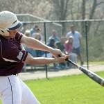 Naugatuck’s Karl Johansen connects with a pitch Monday at Woodland. The Greyhounds held on to defeat the Hawks 4-2, after scoring all their runs in the first. -LARAINE WESCHLER