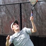 Naugy’s No.1 seed, Richard Mitchell, serves it up Monday against Naugatuck. He was defeated by Woodland’s Mike Krakowski, 8-2.