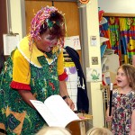 Leah Feeney, right, is amazed by the magic of Sparkles the Clown. Sparkles performed for the students at Tender Years Preschool May 13.
