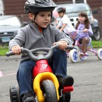 Matt DosSantos peddles around the parking lot of Tender Years Preschool in Naugatuck during the annual Trike-a-Thon May 20.