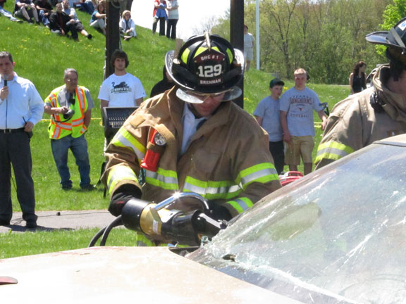 A victim is extricated from his car during a mock crash demonstration staged at Woodland Regional High School.