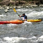 Dan Ney kayaks through some rapids on the Naugatuck River during the 4th annual Naugatuck Valley River Race May 7. PHOTO BY ELIO GUGLIOTTI