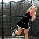 Woodland’s Lauren Temaglio battles it out on the tennis court during the Hawk's match against Watertown May 9. - PHOTO BY LARAINE WESCHLER
