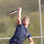 Naugatuck's John Dana reaches for the ball during a doubles match against Crosby May 9. - PHOTO BY LARAINE WESCHLER