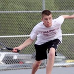 Naugatuck's Jake Morrissey reaches for the ball during a singles match against Crosby May 9. - PHOTO BY LARAINE WESCHLER