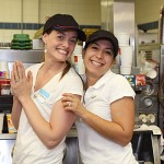 Western Elementary School teacher Heather MaKarewicz, left, and school psychologist Liliana Felix, right, take a break from serving drinks for a photo op during Teacher's Night at McDonalds on Rubber Avenue in Naugatuck. Ten teachers worked at McDonald's from 5-8 p.m. June 2 to raise money for the school. Ten percent of sales will be donated to the school.