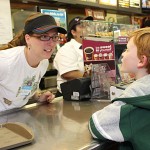 Western Elementary School teacher Michelle Baker, left, takes an order from Gabriel Sidoti, 8, a student at the school, during Teacher's Night at McDonald's on Rubber Avenue in Naugatuck. Ten teachers worked at McDonald's from 5-8 p.m. June 2 to raise money for the school. Ten percent of sales will be donated to the school.
