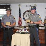 Prospect Mayor Robert Chatfield, left, honors Prospect Police officers, from left, Andy Giordino, Nelson Abarzua, and Douglas Fairchild for their role in capturing two bank robbers following a March 26 robbery of Wells Fargo Bank in Prospect.