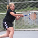 Naugatuck High School graduate Meghan Toth practices her tennis skills with her dad during the Naugatuck Tennis Open July 29 at Naugatuck High School.
